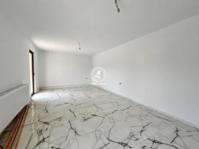 Casa cu 4 camere si 400mp de teren in Voinesti - foto 3