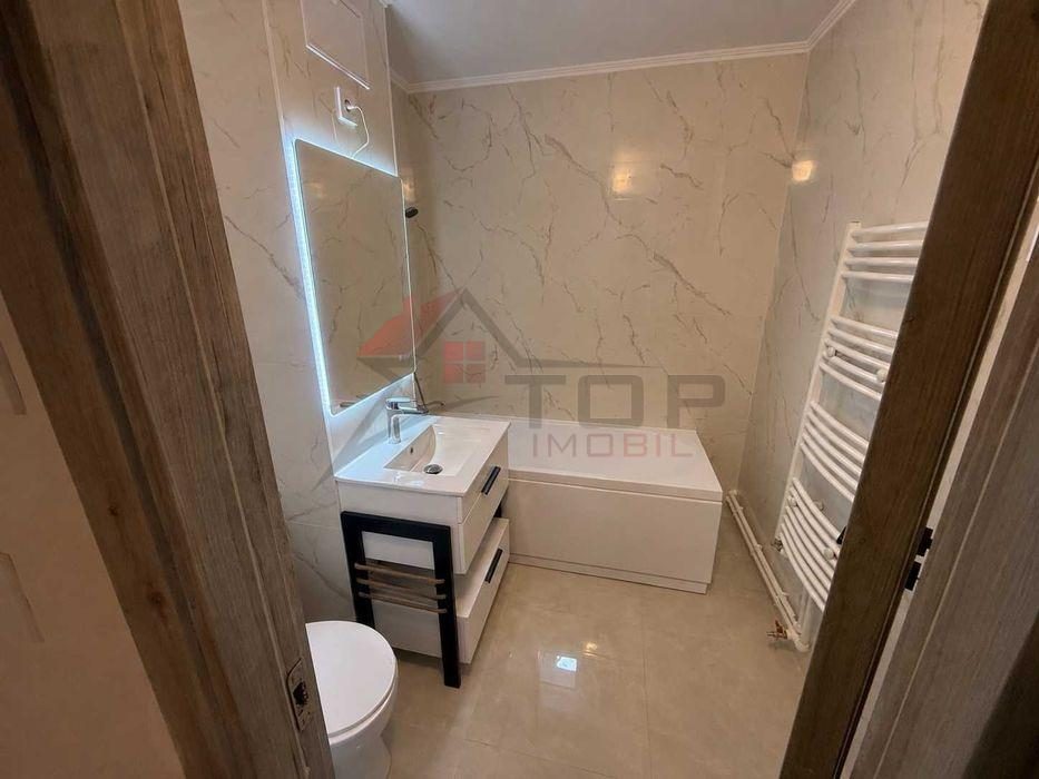 Dacia - statia Bicaz, ap 2 camere decomandat 56mp, renovat complet, liber - Iasi