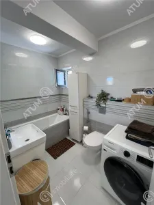 De vanzare apartament cu 2 camere balcon 2 locuri parcare si pod situat in zona LIDL Selimbar - foto 10