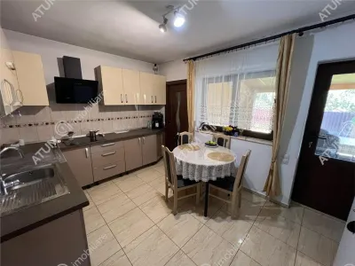 De vanzare casa cu 3 camere pivnita si pod amplasata pe teren de 438 mp zona Calea Cisnadiei din Sibiu - foto 7